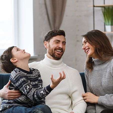Hands holding an animated tooth and umbrella